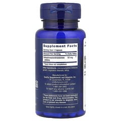 Blue supplement bottle with label on a white background