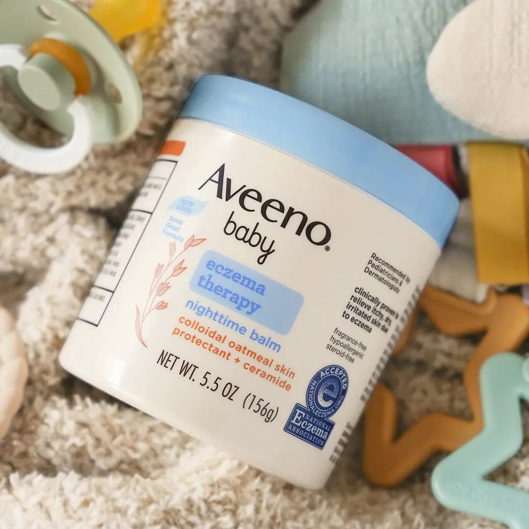 An advertisement image showing a baby with eczema being held by an adult, with the text '#1 Baby Eczema Brand' and product details.

