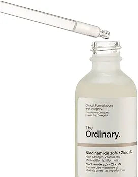 Skincare bottle with dropper labeled 'The Ordinary' on a white background


