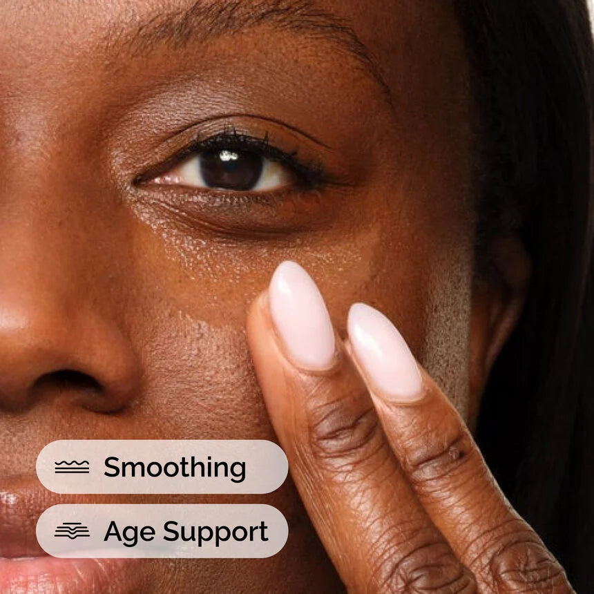 Close-up of a woman's face with a finger pointing to her skin, labeled 'Smoothing' and 'Age Support'.

