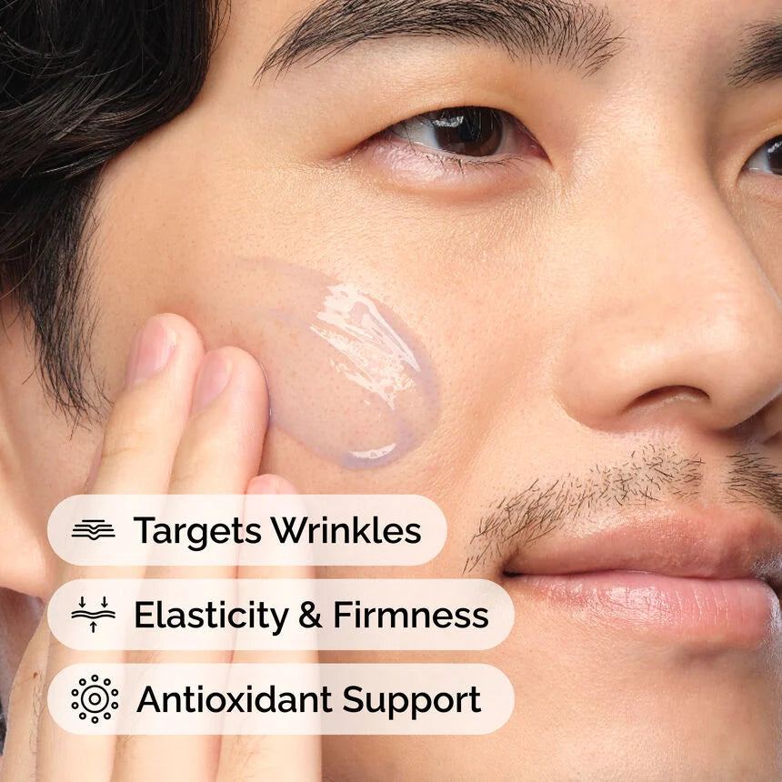 Close-up of a man applying cream to his face with text highlighting benefits.

