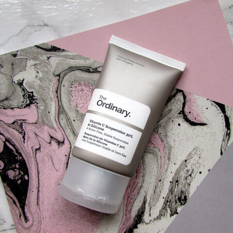 Tube of 'The Ordinary' Vitamin C Suspension 30% on a marble surface

