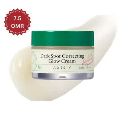 Jar of Axis-Y Dark Spot Correcting Glow Cream with a green lid on a white background

