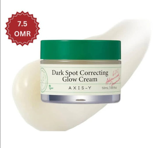 Jar of Axis-Y Dark Spot Correcting Glow Cream with a green lid on a white background


