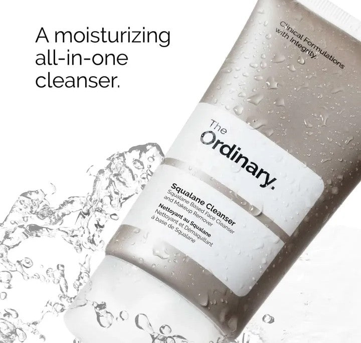 The Ordinary squalane cleanser with water droplets on a white background


