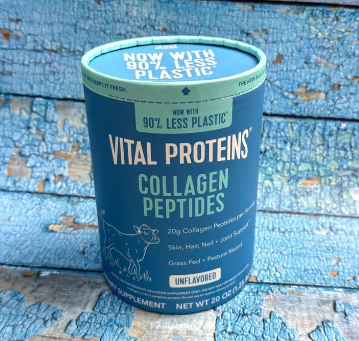 Vital Proteins Collagen Peptides container on a blue wooden background

