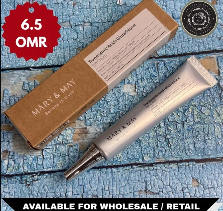 Mary & May skincare product with packaging on a textured blue surface