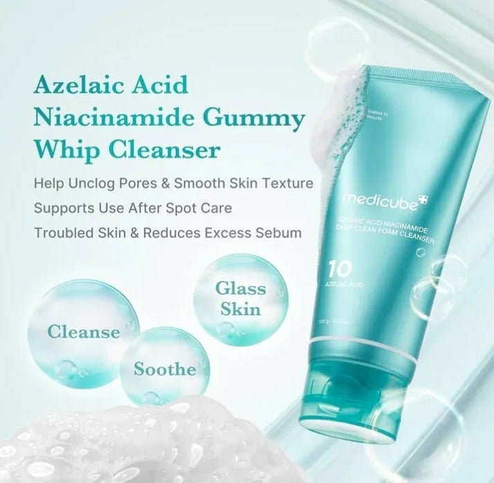 Teal cleanser bottle with text about Azelaic Acid Niacinamide Gummy Whip Cleanser on a light blue background.

