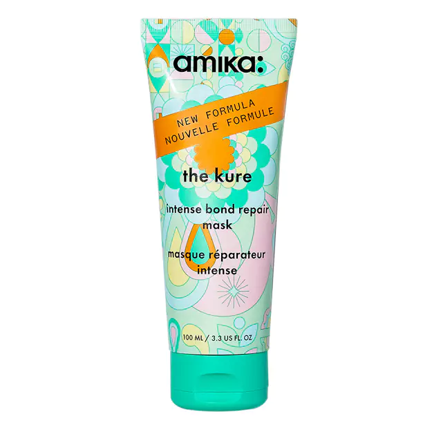 A tube of Amika The Kure Intense Bond Repair Mask with a colorful design on the label.


