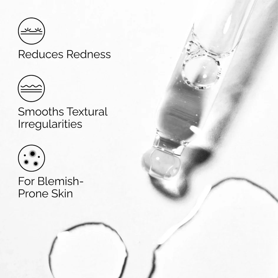 Skincare serum bottle with dropper and text highlighting benefits on a white background