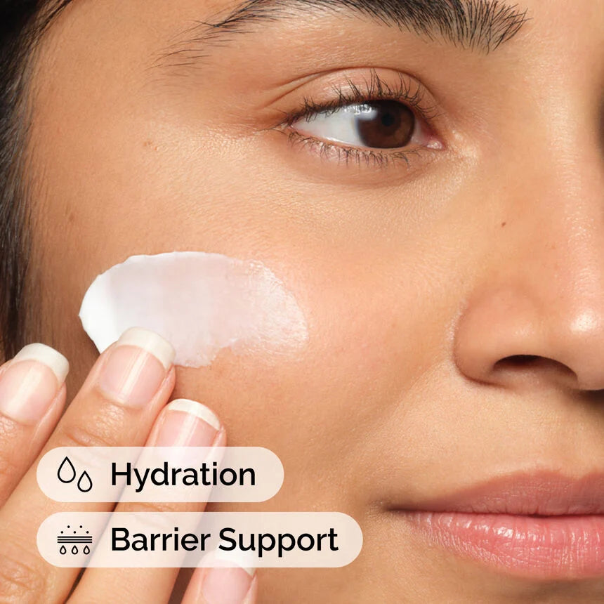 Person applying cream to their face with 'Hydration' and 'Barrier Support' text overlay.

